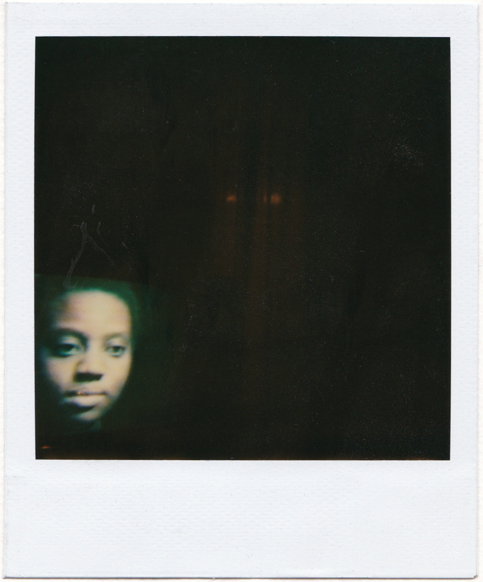 Cauleen Smith, Still from Chronicles of a Lying Spirit by Kelly Gabron, (1990). Polaroid. Digital scan.